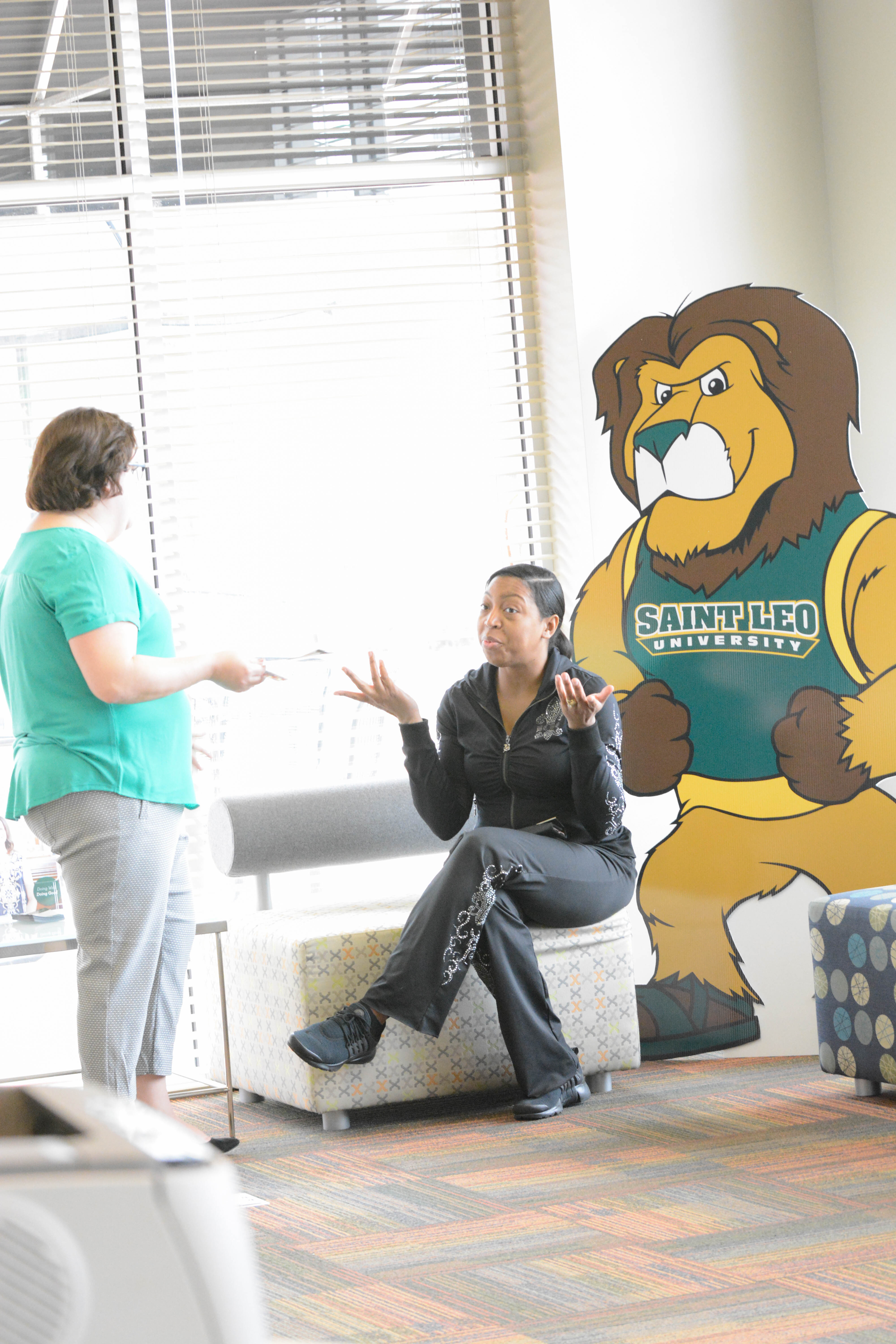 The Jacksonville, FL Education center director Jessica Starkey with a newly enrolled student